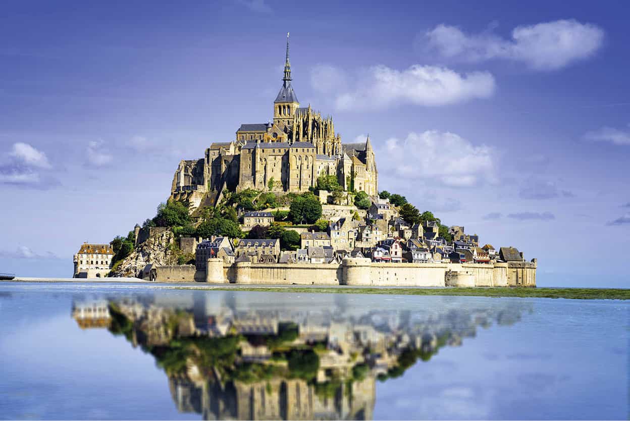 Mont-St-Michel The medieval abbey stands on an isolated rock rising out of a - photo 4