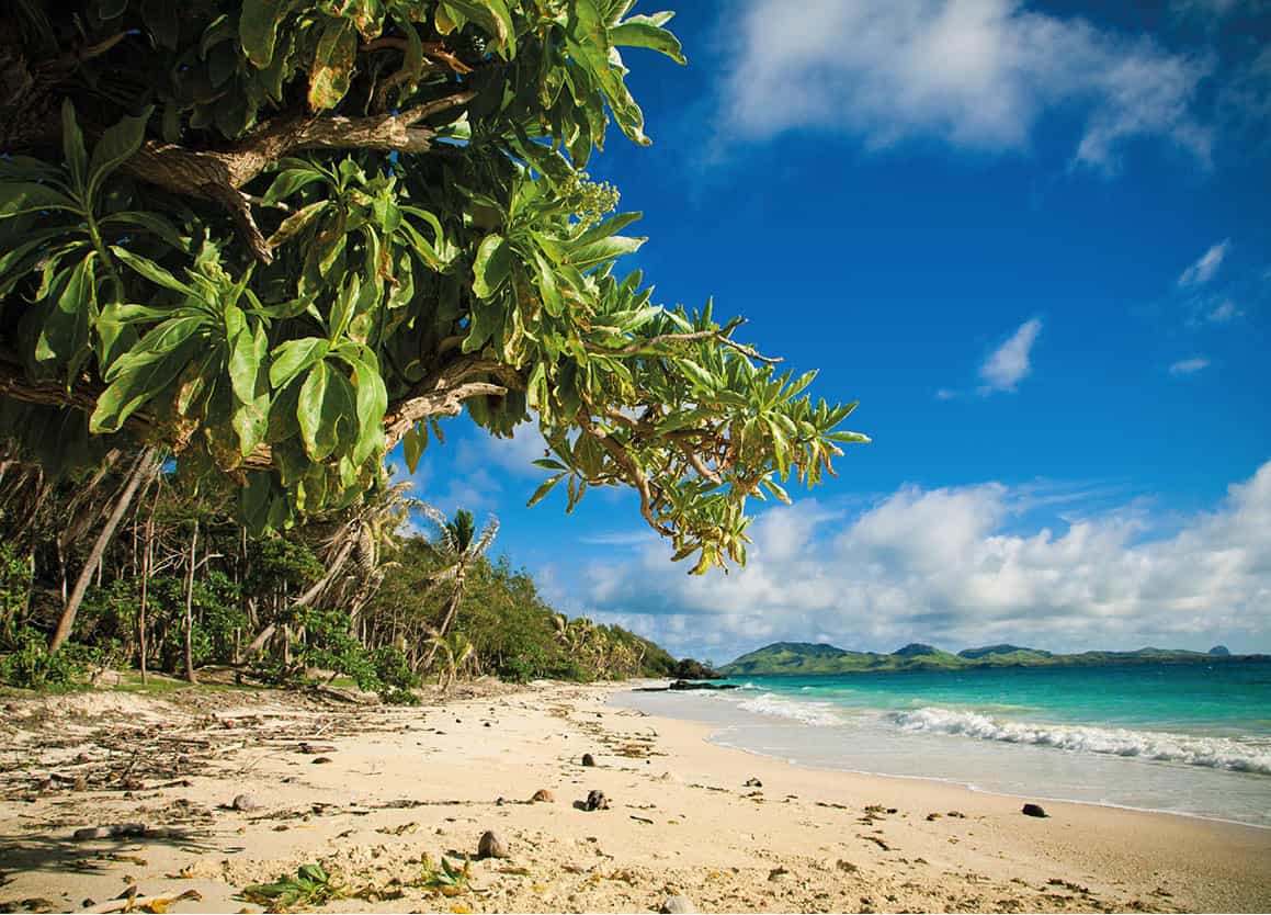 Beach bums Fiji is synonymous with sun-bleached white beaches brushed by - photo 4