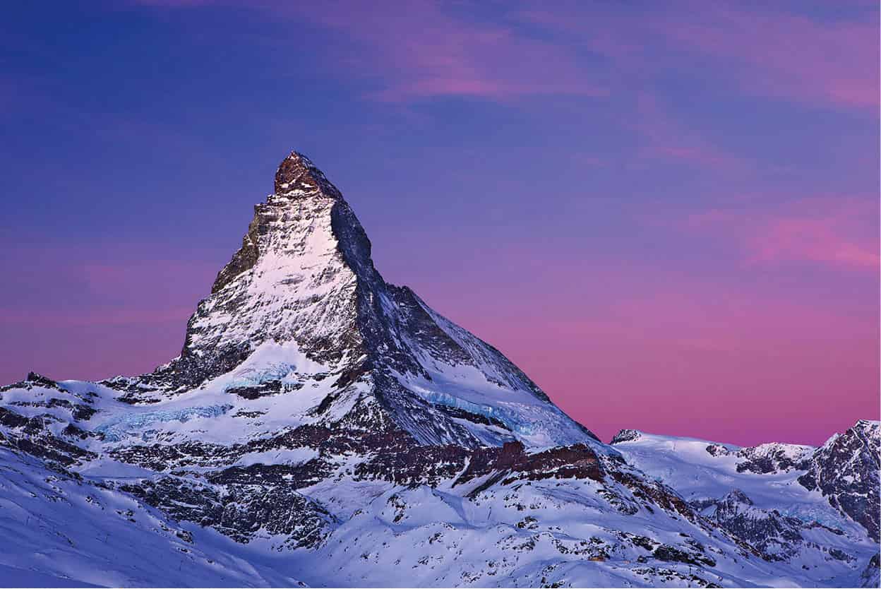 The Matterhorn Switzerlands iconic pyramidal peak towers above the resorts of - photo 4