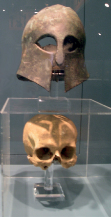 Greek Corinthian helmet and skull reportedly found inside it from the Battle of - photo 14