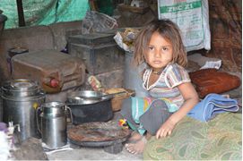 We were walking through the slum that one of the children in this book Kala - photo 3