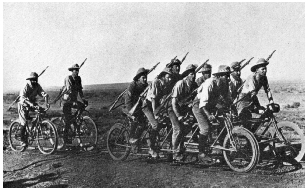 Scout Unit on modified tandem cycles using the railway line to cross the - photo 9