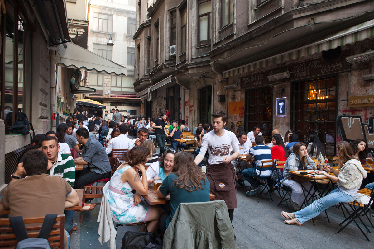 Young people drinking and dining out in a backstreet of Tnel Alamy When to - photo 5