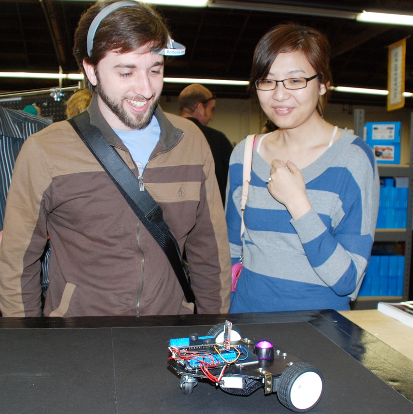 Figure 4 Attendees control our robot at Maker Faire We were surprised that it - photo 5