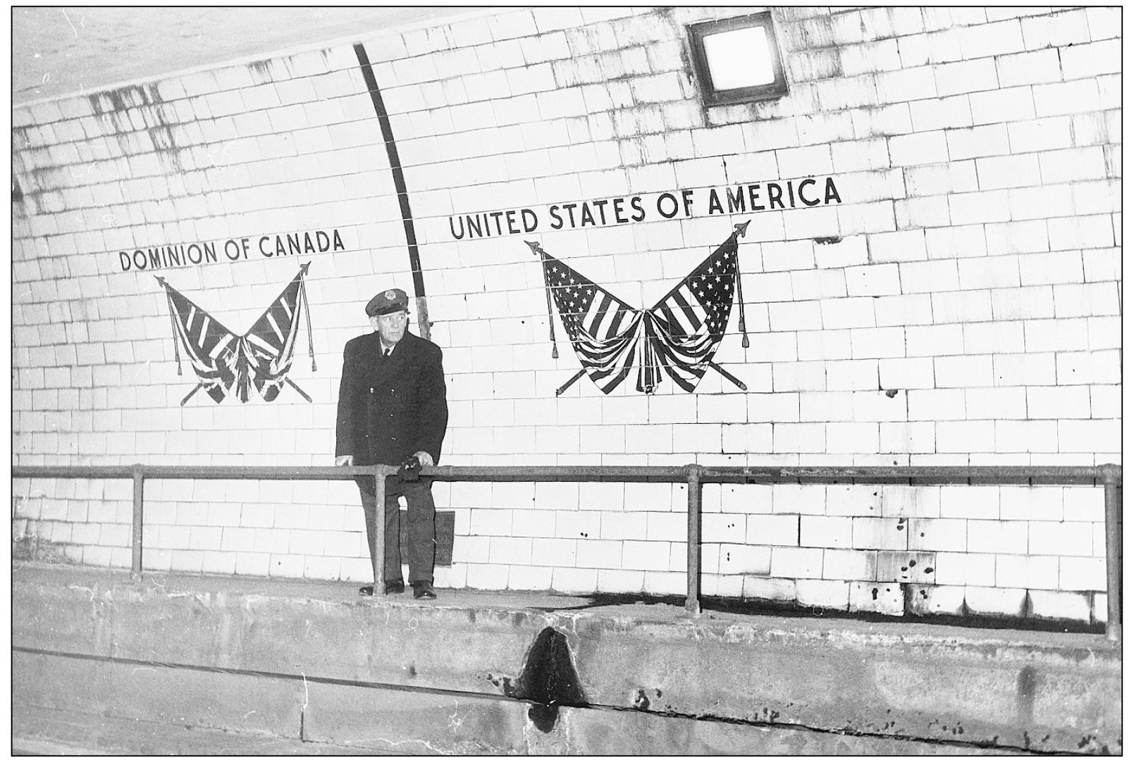 THE INTERNATIONAL BORDER 1930 An employee of the Tunnel Company stands at the - photo 6