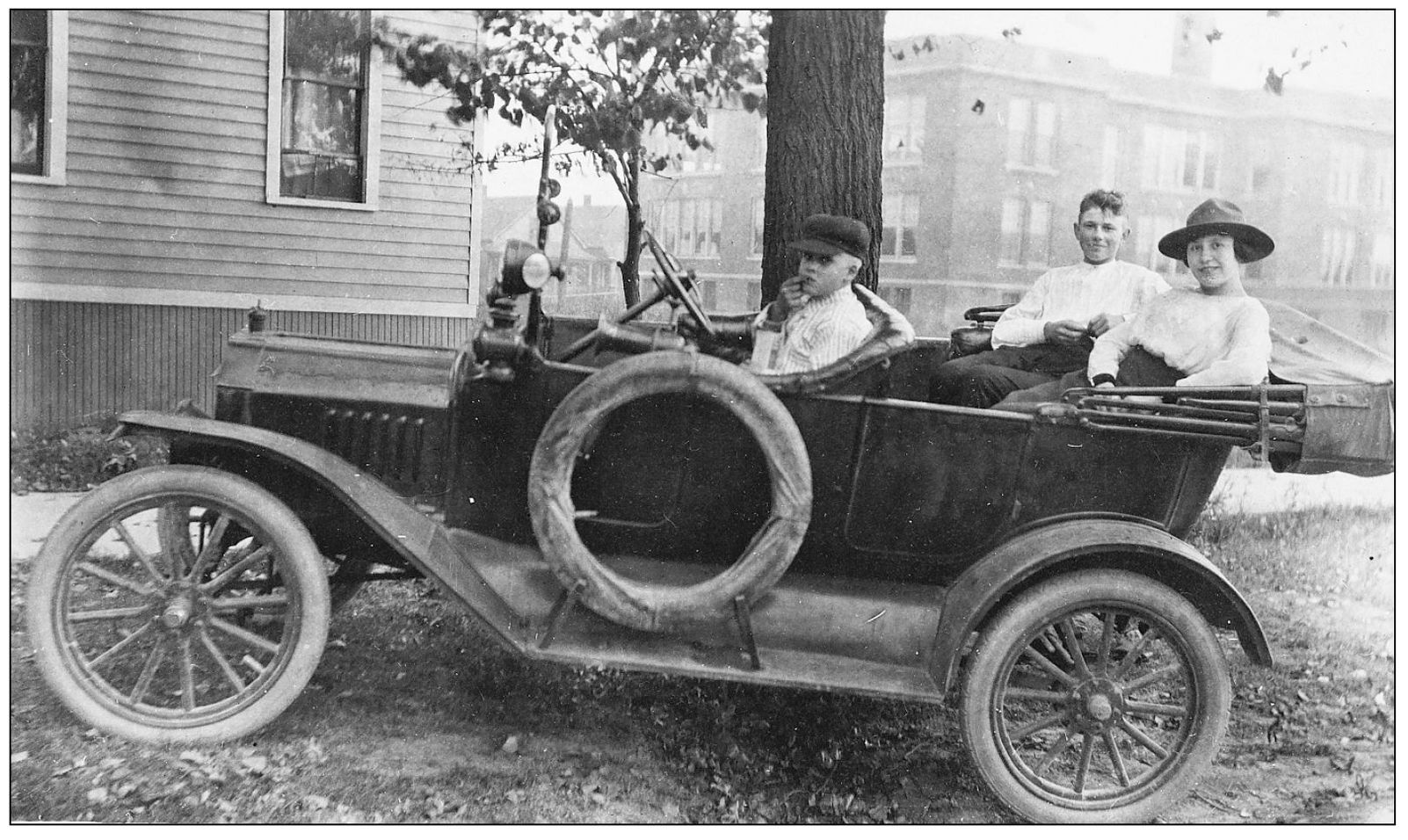 THE UNIVERSAL CAR The 1915 Model T Town Car is shown here in front of the - photo 11