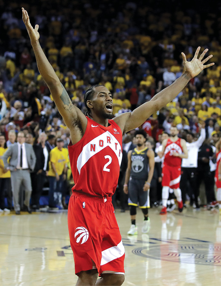 Kawhi Leonard celebrates as the clock finally runs out and the Toronto Raptors - photo 5