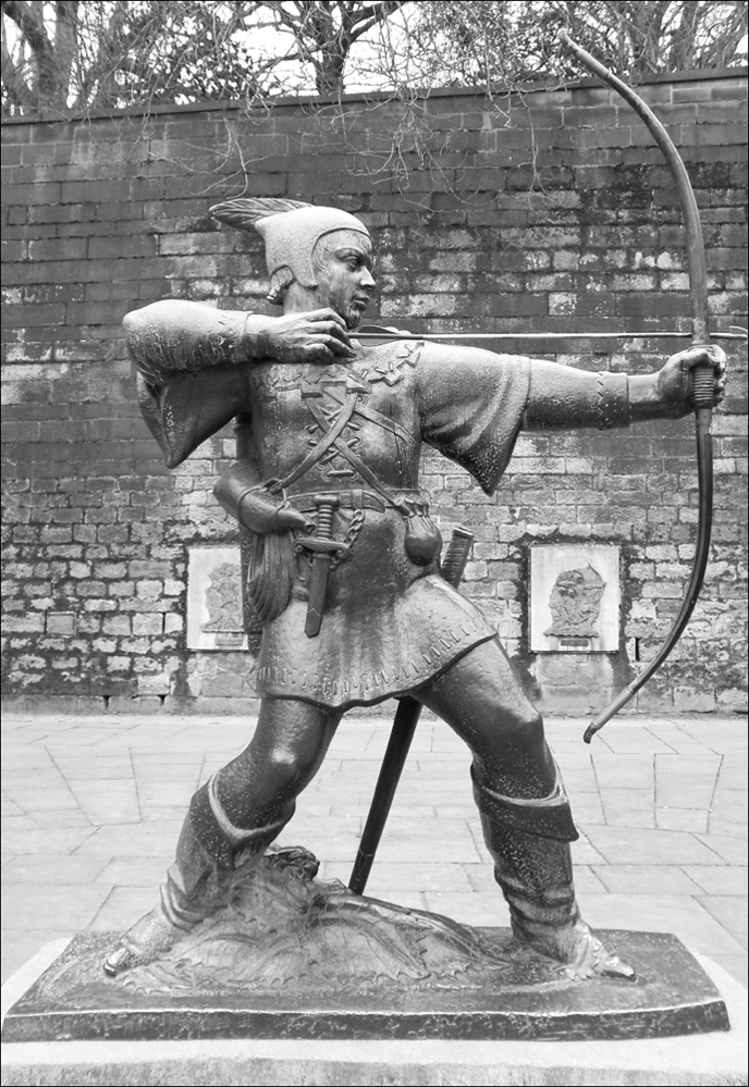 A statue of the legendary outlaw Robin Hood which stands on Castle Road The - photo 1