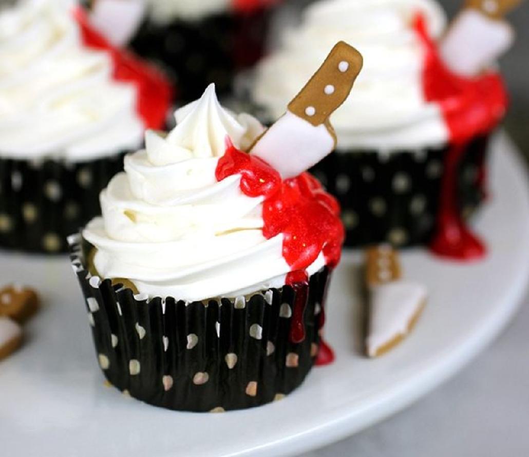 These cupcakes offer a pale base with veins of red buttercream and black - photo 4