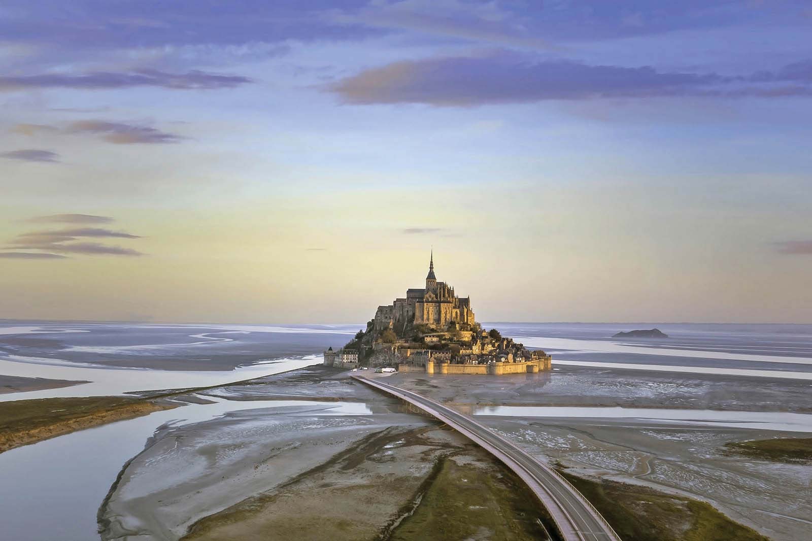 at Mont-Saint-Michel the Gothic monument that towers high above a tidal plain - photo 17