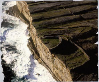 Left Dun Aengus is an ancient Irish stone fort that is perched 300 ft 100 m - photo 5