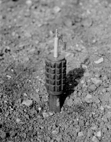 A Soviet POMZ anti-personnel fragmentation mine The mine detonates when the - photo 17