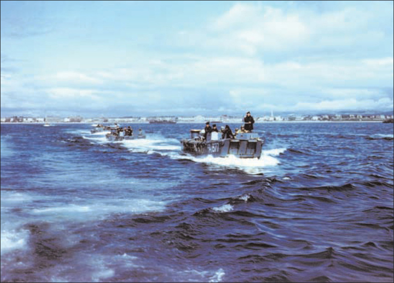 A flotilla of LCAs carrying US Rangers moves out from harbour into the Channel - photo 6