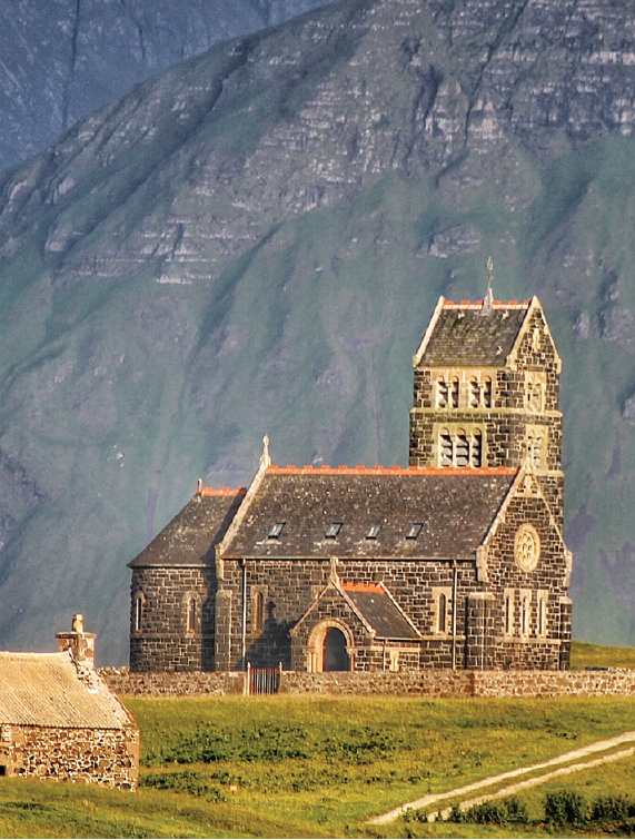 St Edwards Church Sanday with Rms dramatic cliffs behind NNS Iona - photo 17