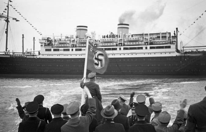 The MS St Louis sails out of Hamburg Germany in front of cheering crowds of - photo 2