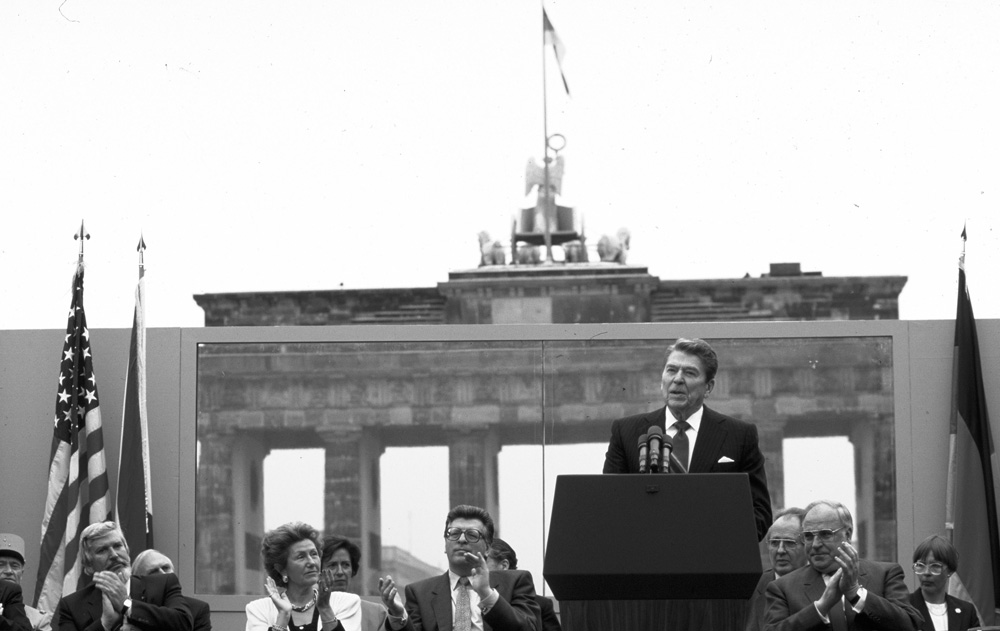 President Ronald Reagan standing at the podium speaking as West German - photo 2