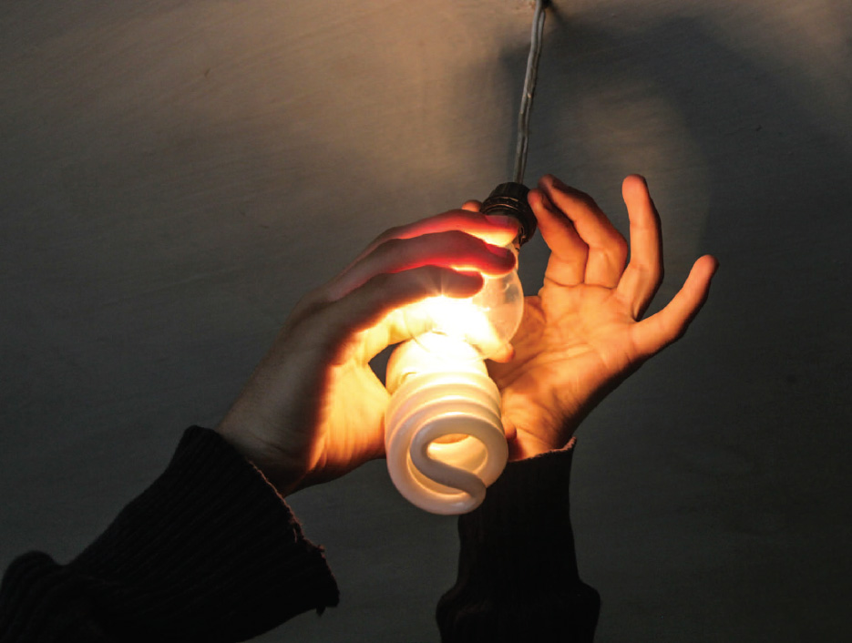 Gaining energy access A light bulb is replaced in a home in Kabul - photo 3