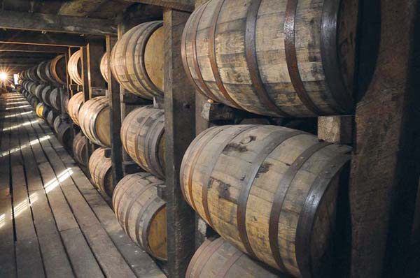 Barrels of bourbon age in a rickhouse at Heaven Hill in Bardstown Kentucky - photo 3