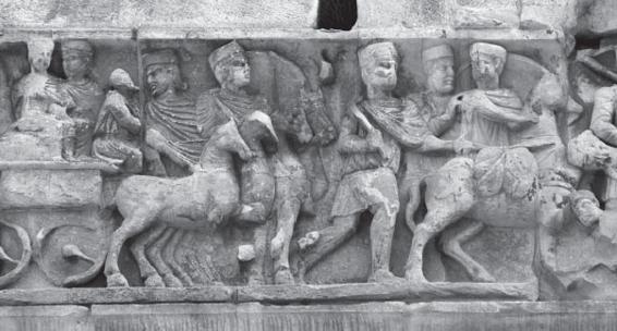 Detail from Arch of Constantine depicting Constantine being driven in a - photo 8