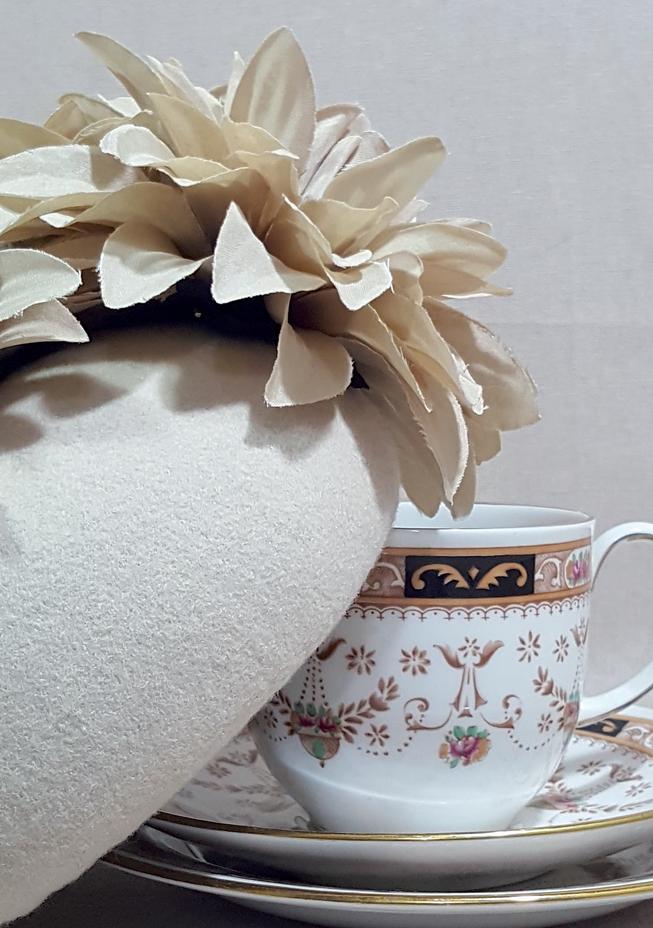 A fawn-coloured felt hat blocked over an oval base and trimmed with fabric - photo 6