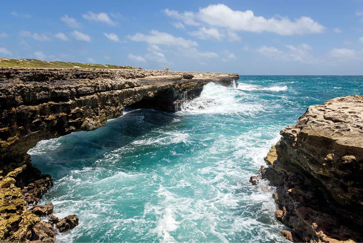 Top Attraction 6 Shutterstock Devils Bridge Waves crash against the rocks and - photo 9