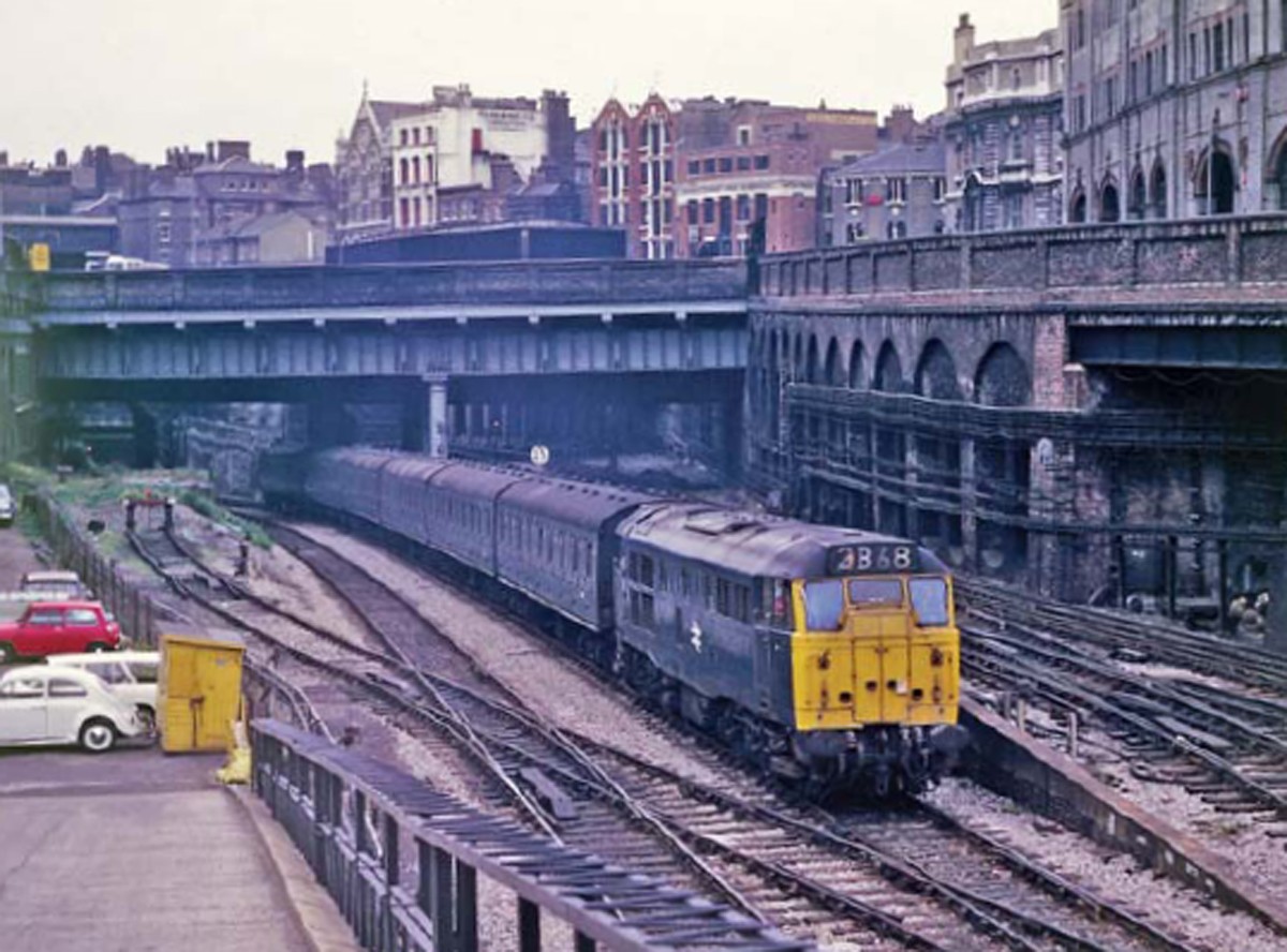 A grimy Class 31 with a commuter train at Farringdon London in 1974 The - photo 10