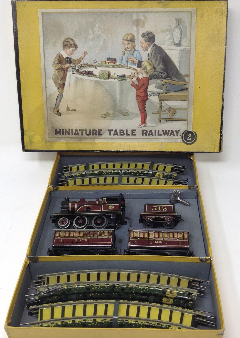 1920s Bing 00 gauge clockwork table top train set in LMS livery produced in - photo 6