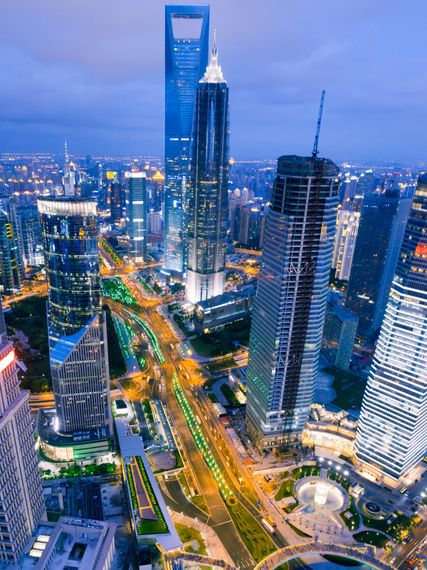 A new skyscraper right ofcenter rises in Shanghai Image ssguyShutterstock - photo 3