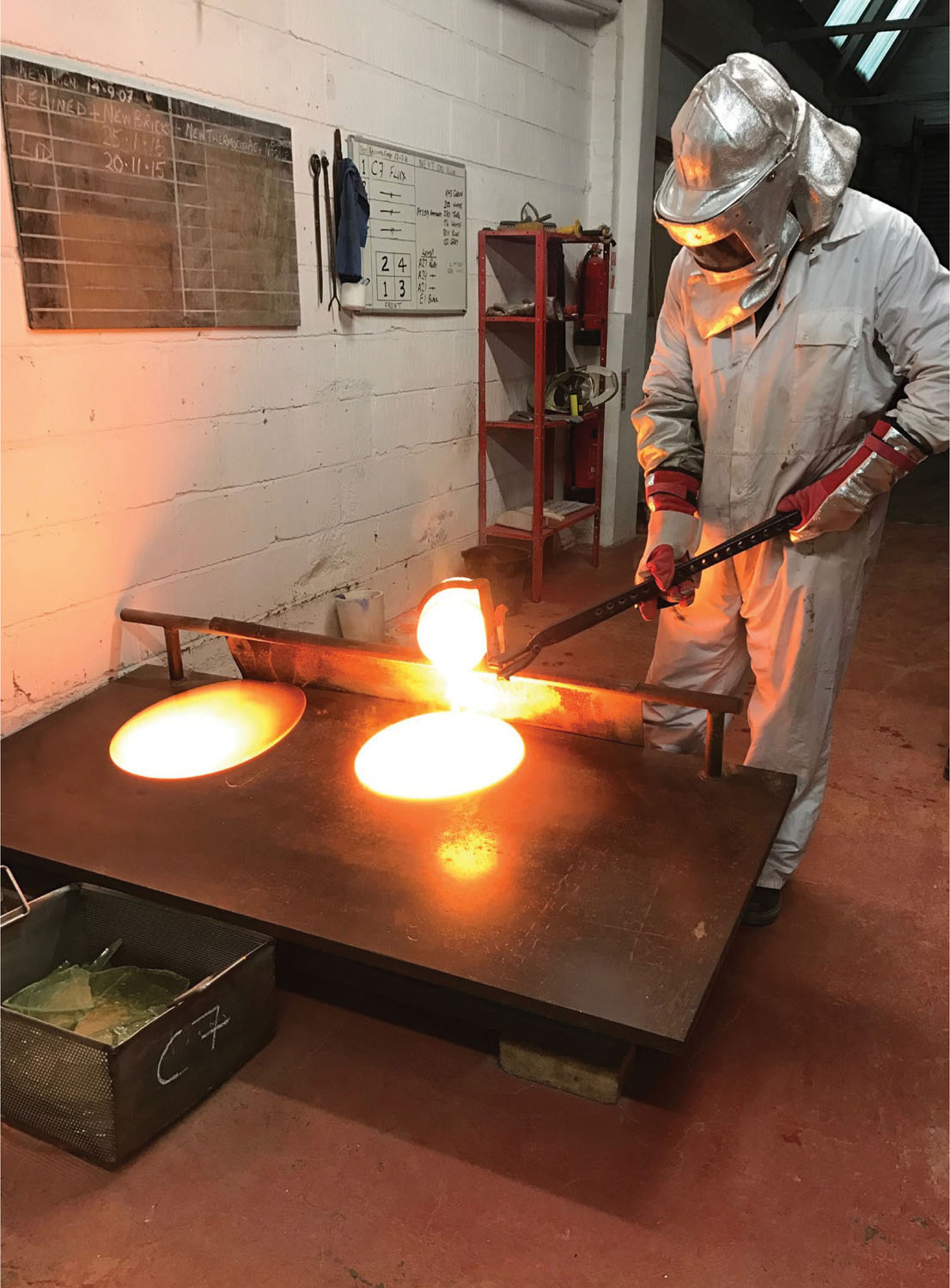 Molten enamel being poured during production at Milton Bridge Ceramic Colours - photo 5