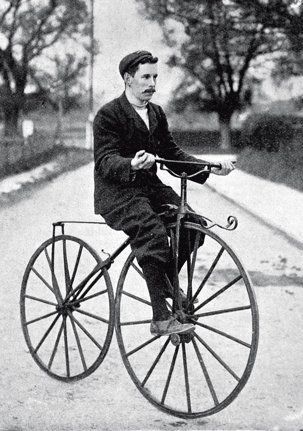 A typical image of a cyclist on a velocipede or bone shaker bicycle widely - photo 6