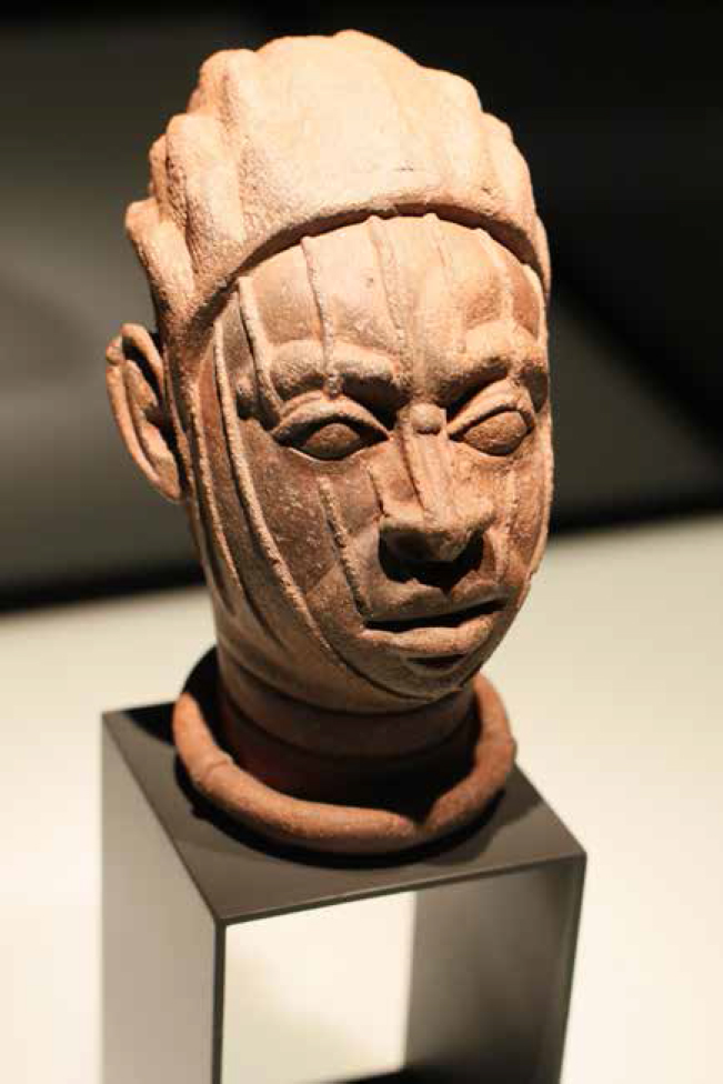 A terra-cotta bust sculpted between the twelfth and fifteenth centuries by one - photo 4