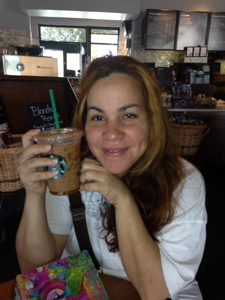 This is me where my story took place sitting in the Starbucks with my journal - photo 2