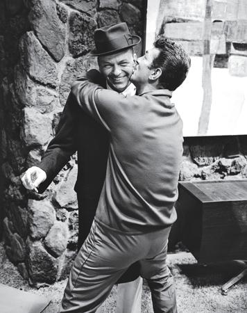 DEAN MARTIN embraces Frank Sinatra on the set of Marriage on the Rocks in - photo 4