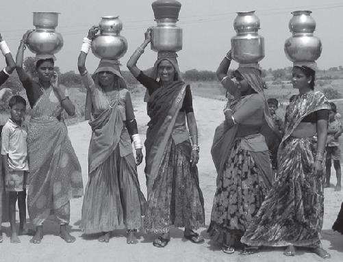 Women with water pots on their way to the wells Photograph courtesy of Kingdom - photo 5