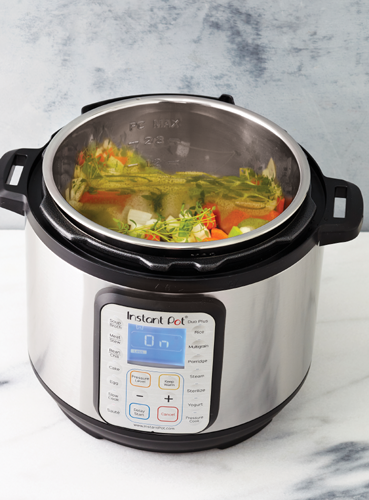 What is the Instant Pot The Instant Pot is a programmed multi-purpose - photo 5