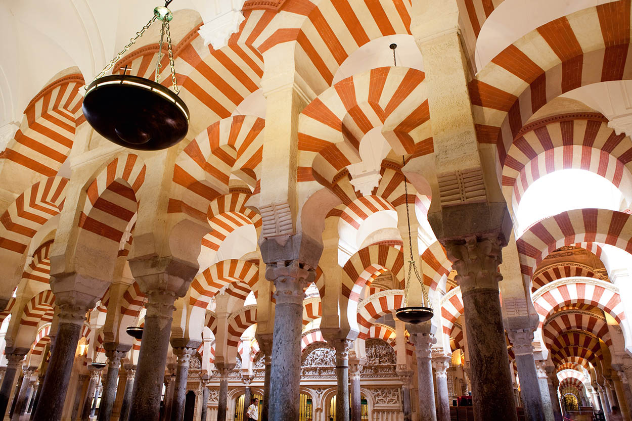 Crdoba A forest of pillars and horseshoe arches the Mezquita mosque here - photo 7