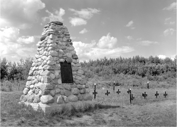 Cairn erected in 1925 at National and Provincial Historic Site of Frog Lake - photo 6