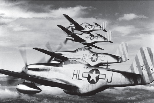 A P-51D formation These planes carry the drop tanks that gave them the range - photo 3