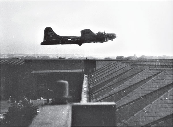 A B-17F hopefully on its last mission buzzes its home base in England Roger - photo 4