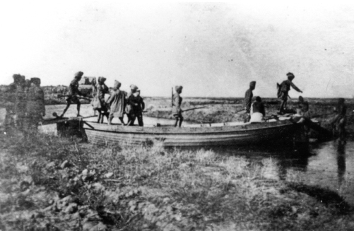 A boat from HMS Espiegle used to cross a deep creek Qurna January 1915 By - photo 6