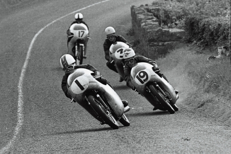 Ernst Degners MZ chases the Hondas of Kunimitsu Takahashi 1 Tom Phillis 19 - photo 1