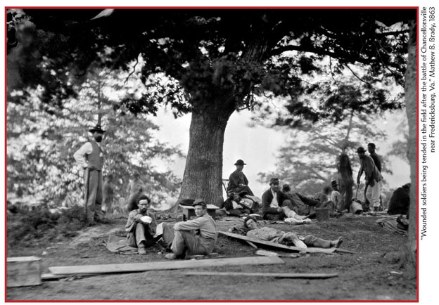 Federal soldiers survey their dead on the battlefield at Chancellorsville near - photo 10