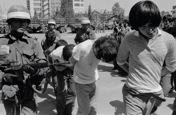 12 Protesters are taken by the army during an uprising that took place in the - photo 14