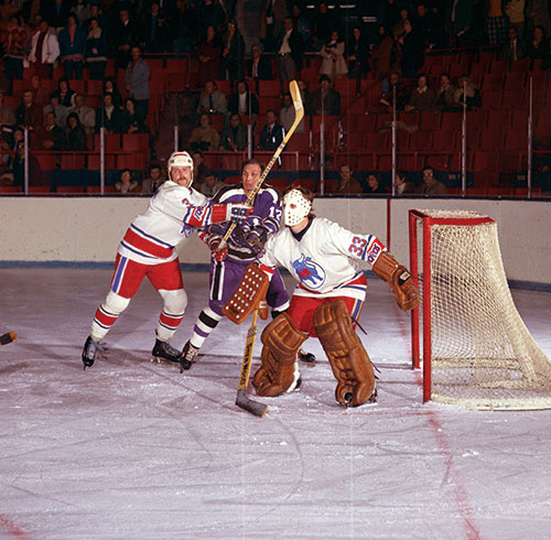 Rick Cunningham keeps Gary Jarrett of the Cleveland Crusaders away from my net - photo 16