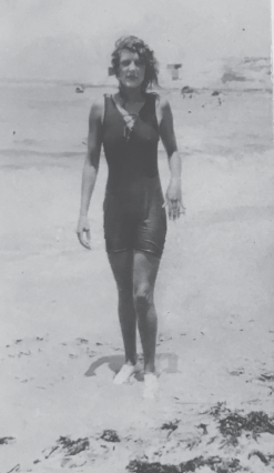 Enid cuts an amazing figure emerging from the water at Manly in 1915 wearing a - photo 8