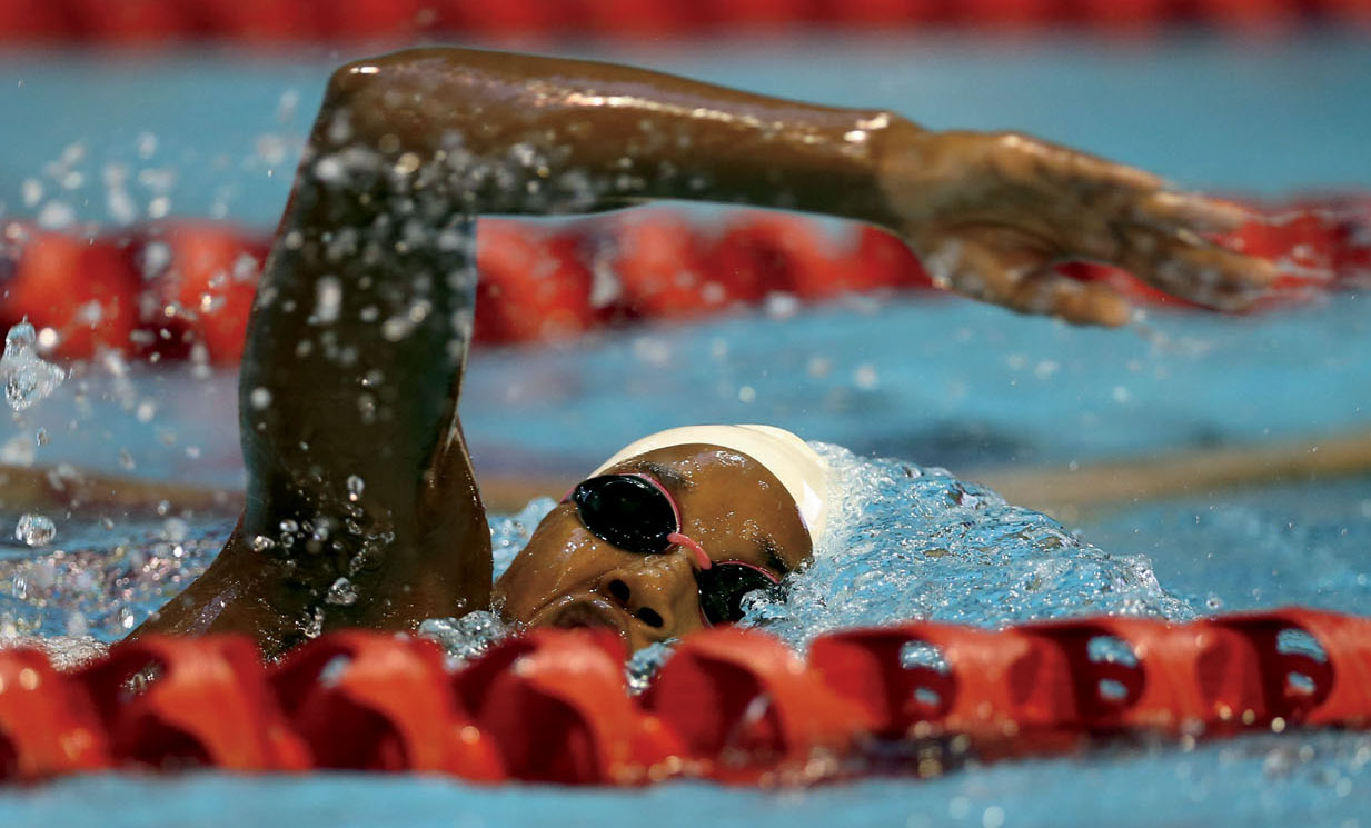 Simone during a training swim before a meet THE ROLE OF RACE When she was 11 - photo 5