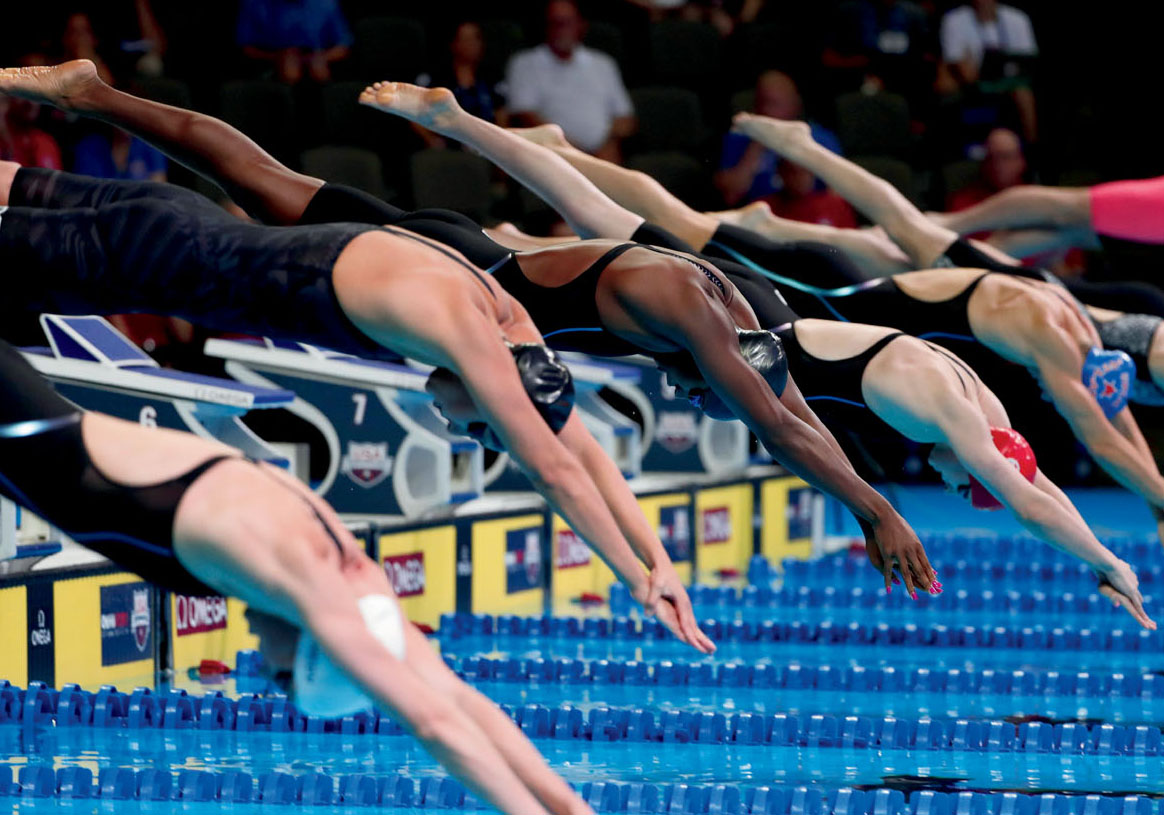 Swimmers begin the 100-meter freestyle at the 2016 Olympic trials Simone swam - photo 9