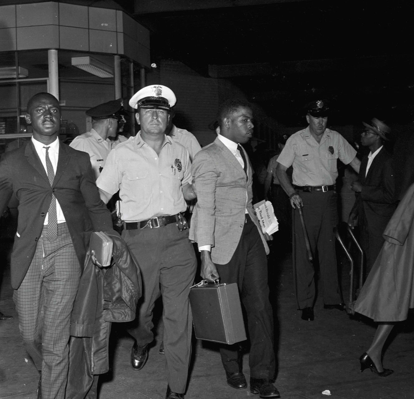 Police arrested Charles Butler left and John right at the station in - photo 7