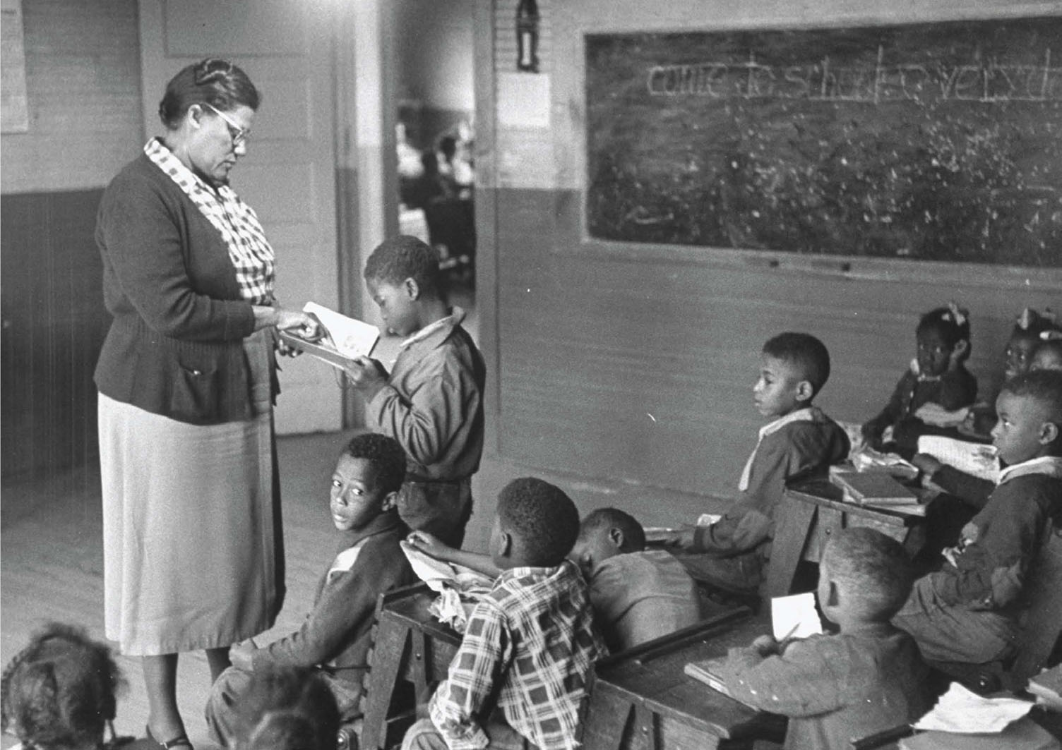 a segregated classroom 1953 John could only go to school when there was no - photo 8