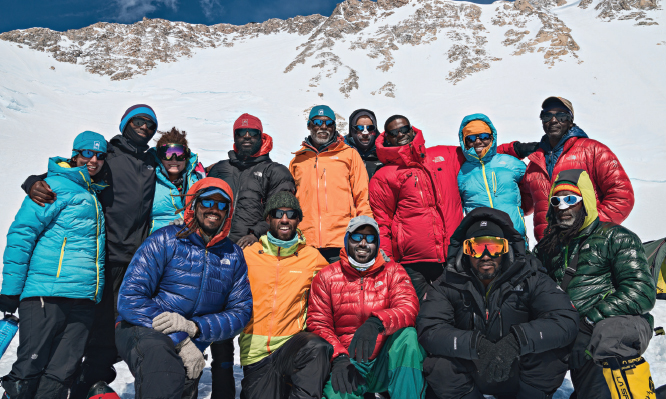 A group photo at 14 Camp of all the people of color on the mountain during the - photo 2